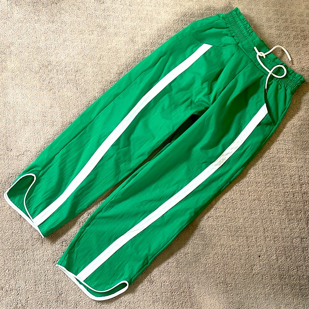 Green joggers, parachute like fabric. Never worn.